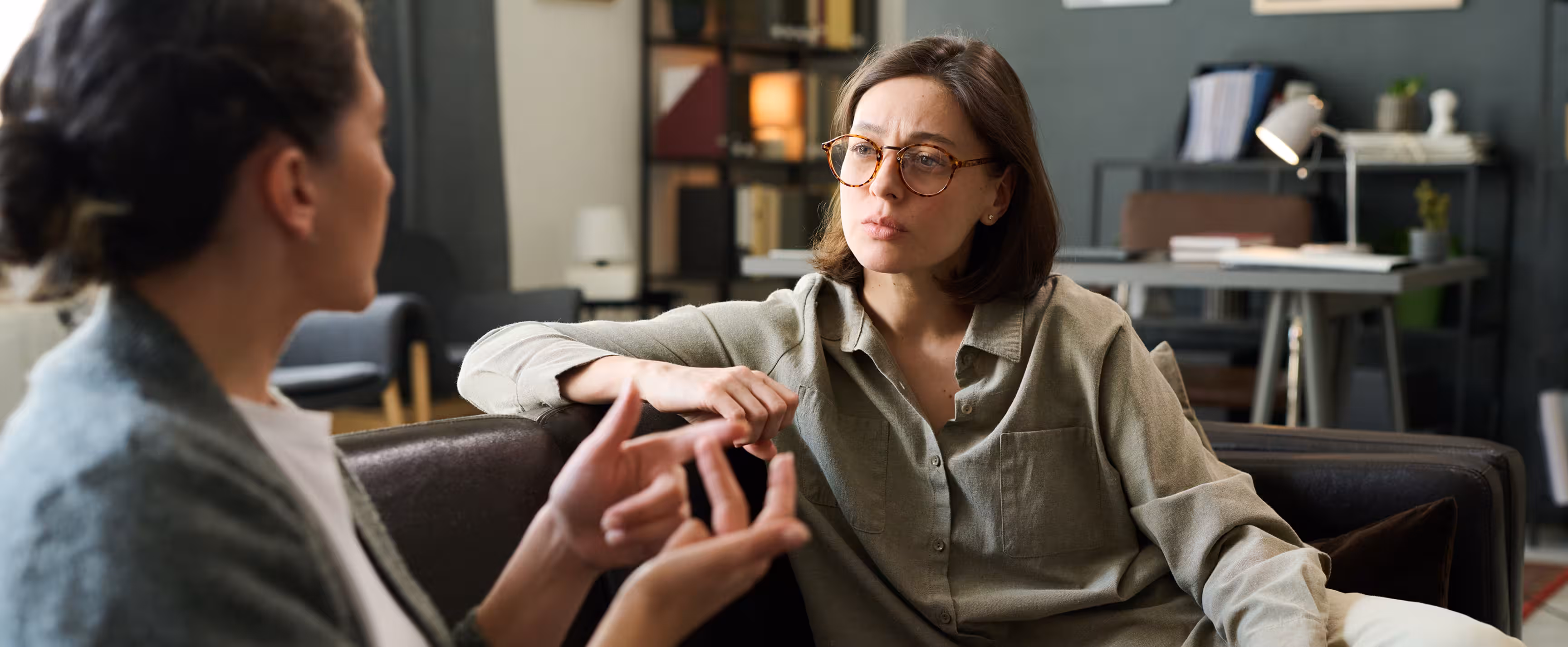 Therapist talking to patient