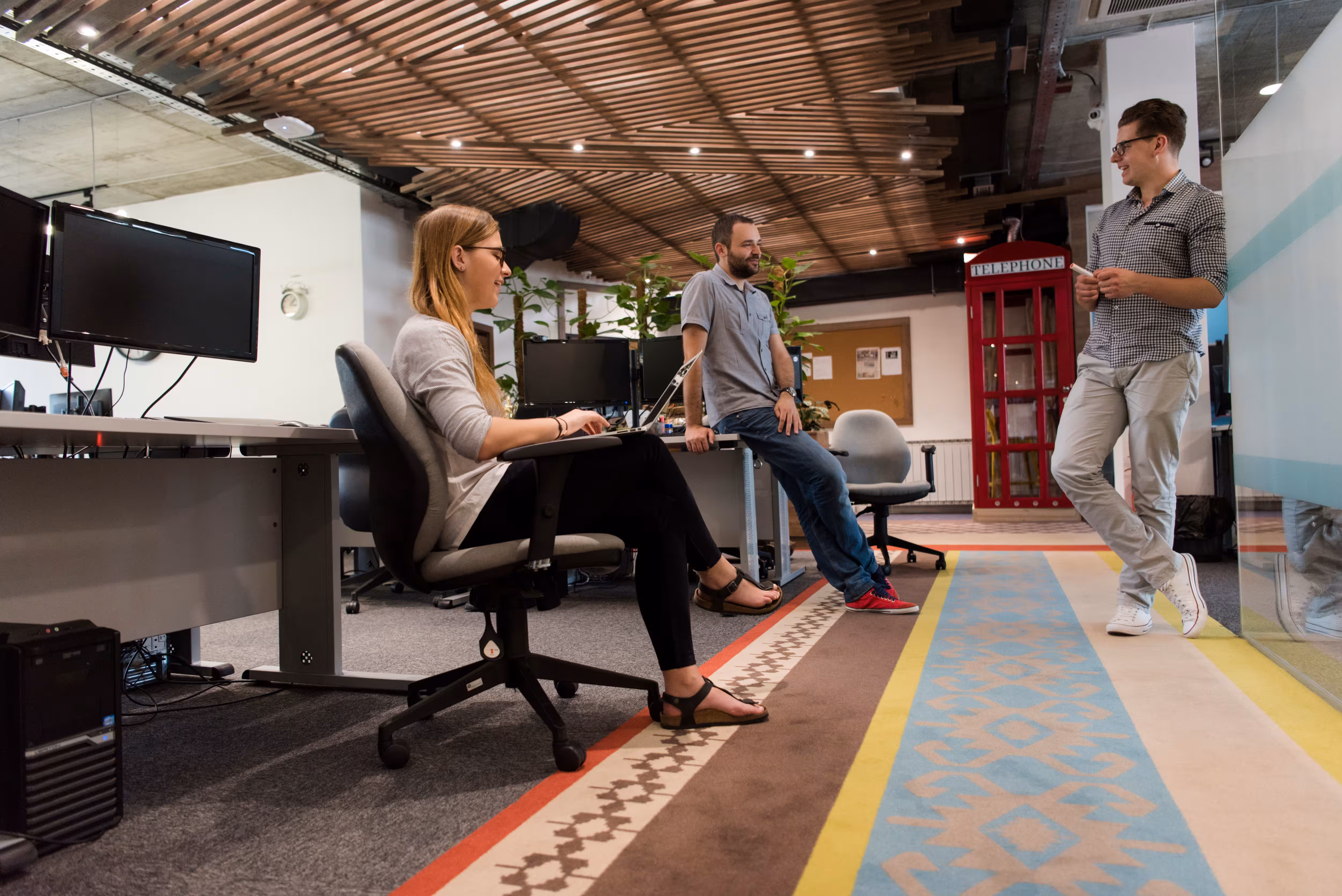 3 creatives working in an office
