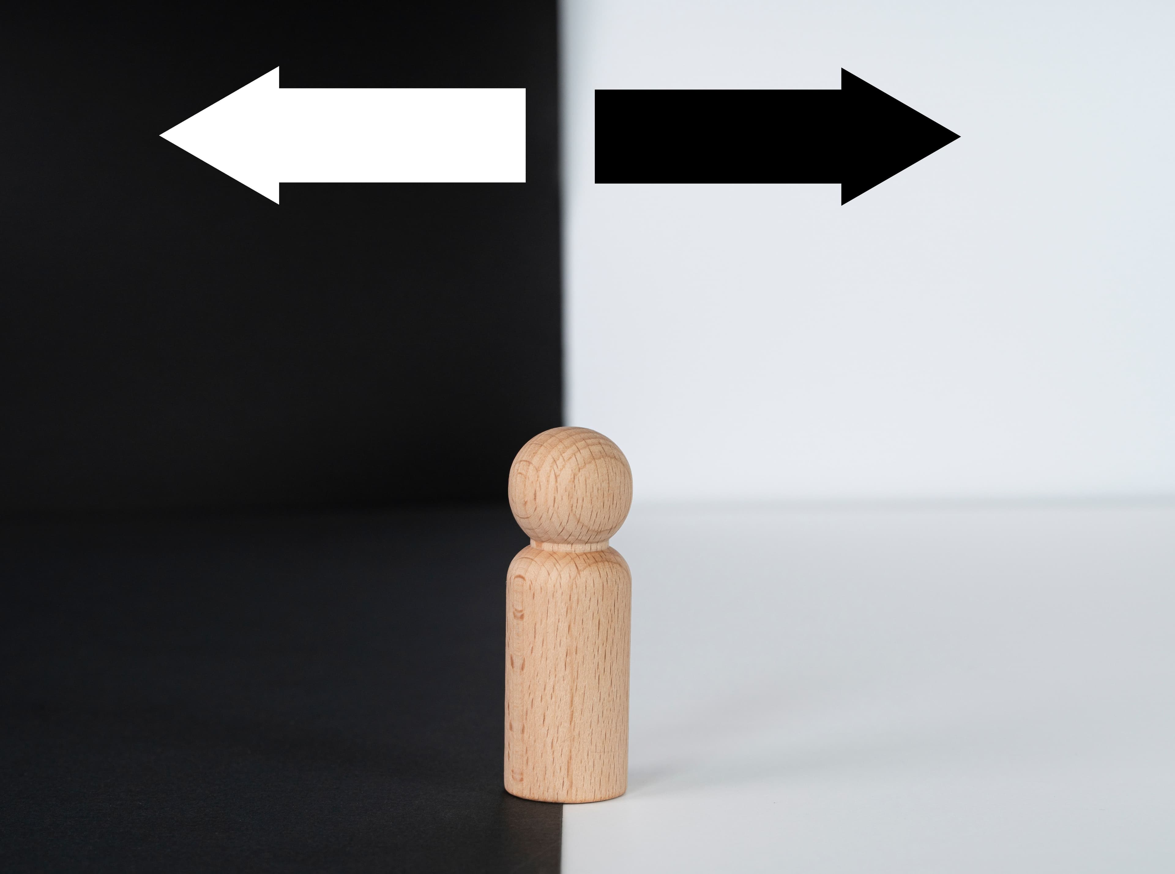 Wooden figure with two pathways for choice